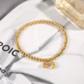 7859 elastic cord lotus bracelet gold
