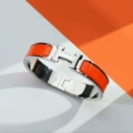 White gold orange h bracelet