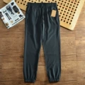 Slim-fit trousers - black (zipper pockets)