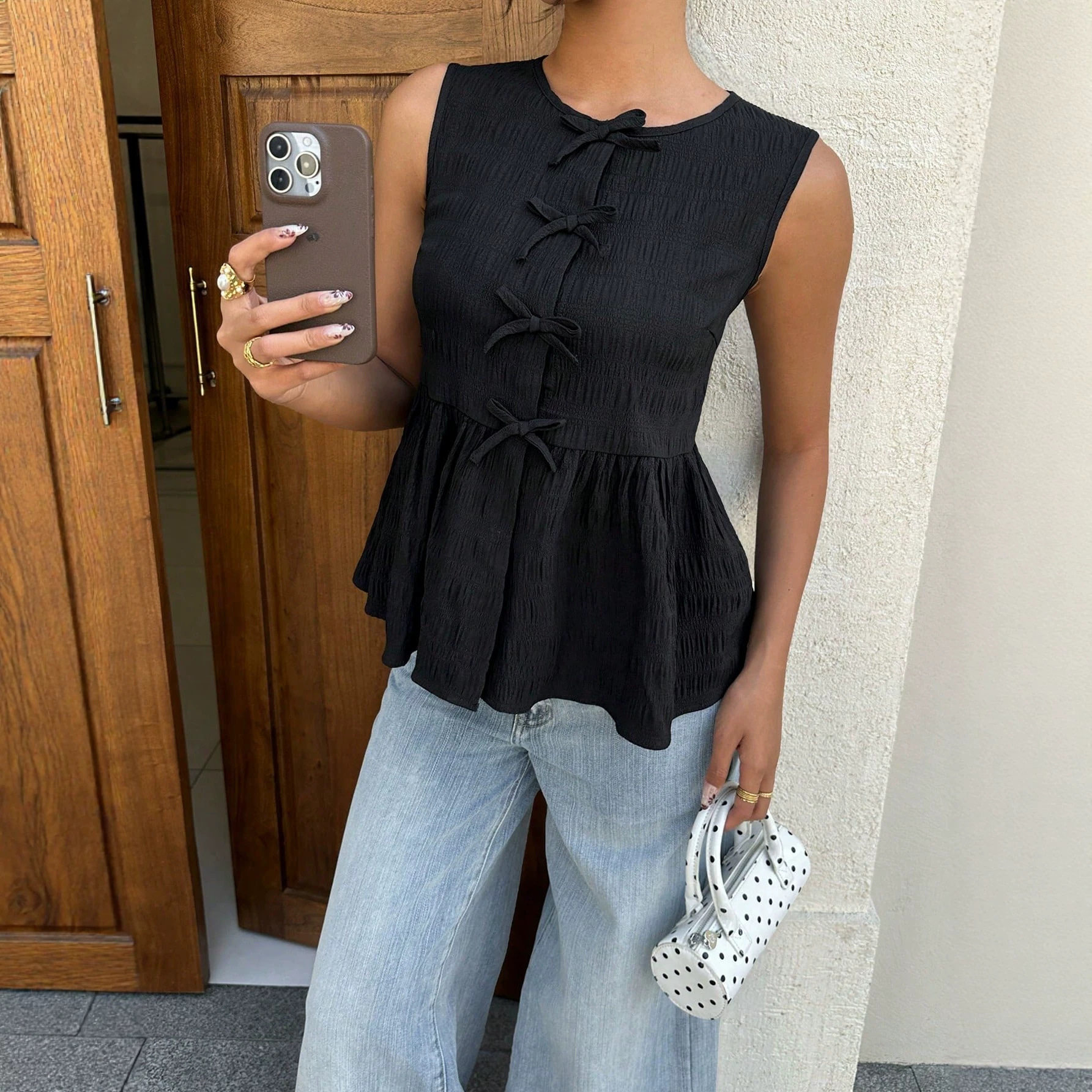 Sleeveless Bow Decorated Top Slim Fit Ruffled Hem Summer Style Perfect for Casual Outings Wholesale Available
