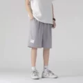 Name Ka ou white standard shorts light gray