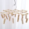 ✅Multifunctional foldable bamboo socks rack household multi-head drying clip windproof pants clip pull hanger two yuan wholesale