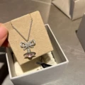 Silver pink ball bow necklace