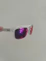 Transparent silver frame with red and blue hair