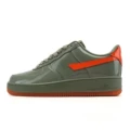 Green-orange patent leather