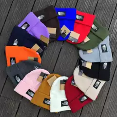 Cross border trendy cold hat rolled edge warm ski hat woven label 80g thick acrylic knitted hat yarn hat