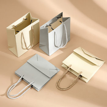 Spot wholesale jewelry box paper bag silver small gift packaging handbag beige fashion high-end gift paper