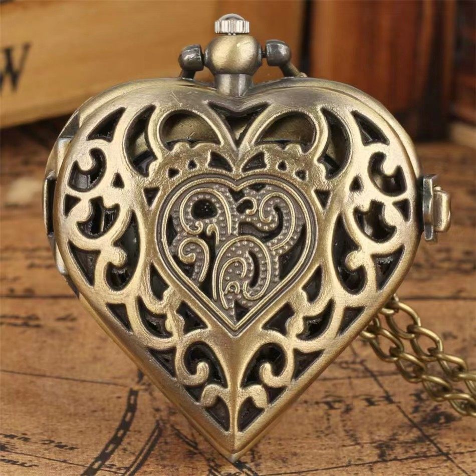 Cross-border hot sale retro hollow heart-shaped silver pocket watch creative flip quartz hanging chain Love pocket watch factory direct sales