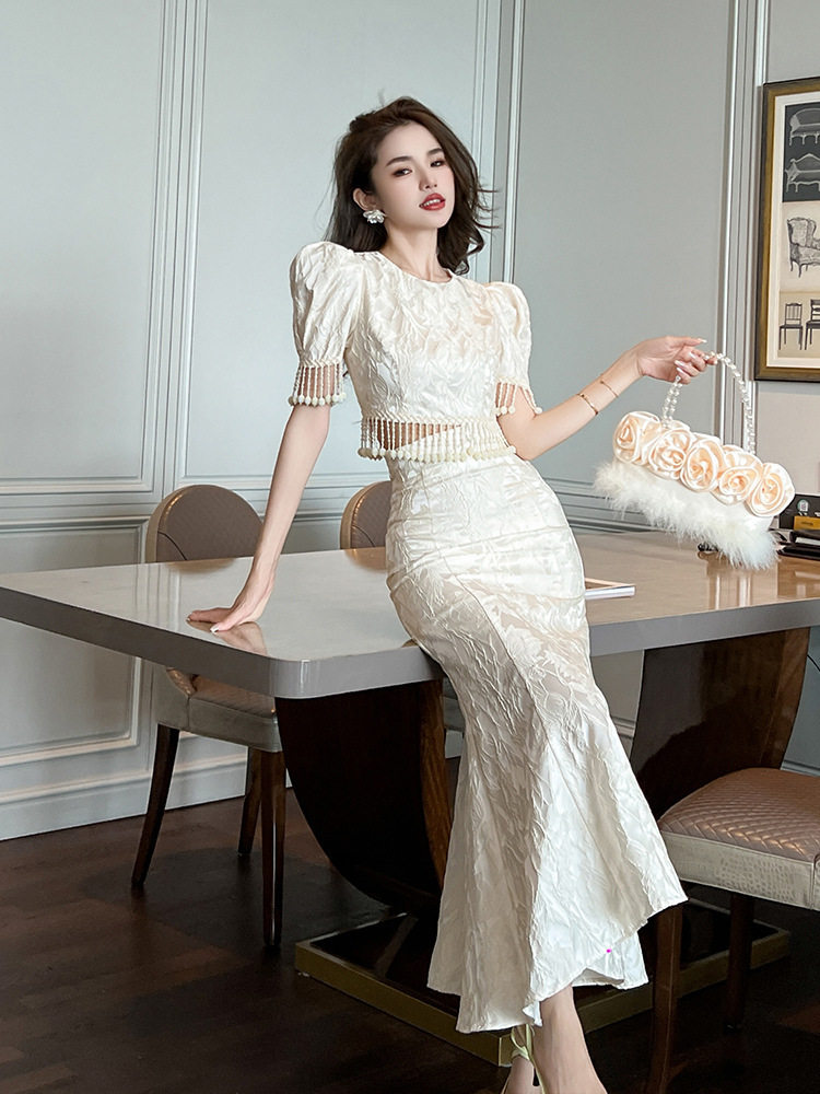 Đầm ôm body nữ cổ tròn tay bồng đuôi cá — [Màu hồng đào]