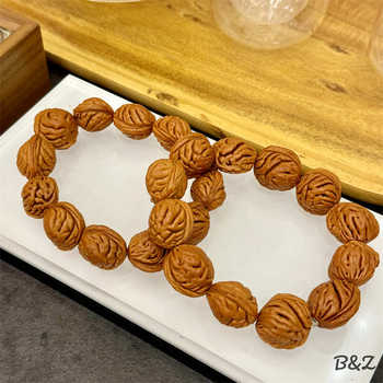 Manufacturers supply natural peach pit bracelet text play single circle peach pit bracelet men and women small red book through hole