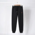 Black sweatpants with red label