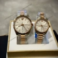 Rose gold with gray accents - left male, right female