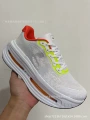 White green orange black swoosh 140