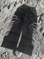 Washed cursive wide-leg pants