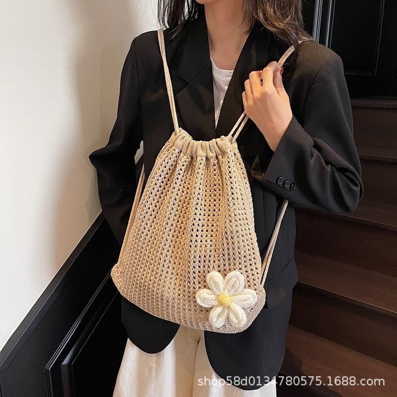 简约休闲针织双肩包女2025新款时尚抽绳编织后背包春夏百搭沙滩包