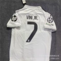 Home jersey (no. 7 vinicius + champions league armband)