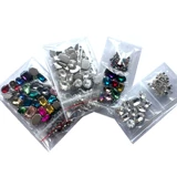 Покупать продукты, такие как стразы, стеклянные швейные бури, бури для когти одежды, швейные камни, аксессуары для отделки рук, материалы и аксессуары