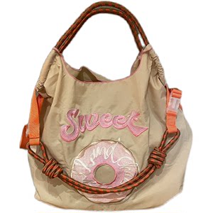Japanese cute donut embroidery environmental protection cloth bag female ball chain new embroidery nylon handbag shoulder