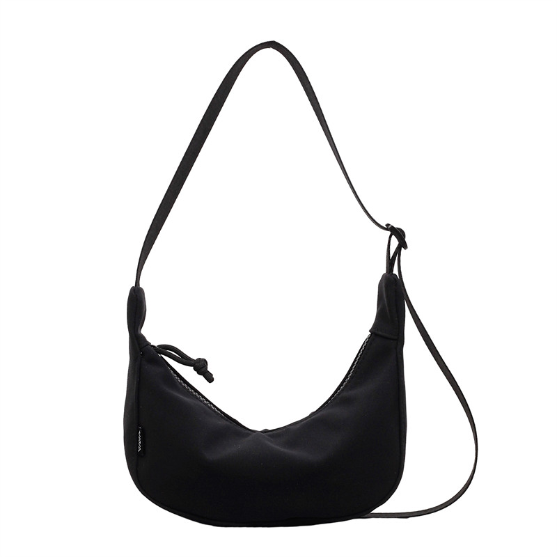 Mini bag for women 2026 new trendy versatile sports student shoulder messenger bag lightweight canvas dumpling bag