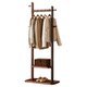 Solid wood clothes hanger at the end of the bed for storing clothes at night