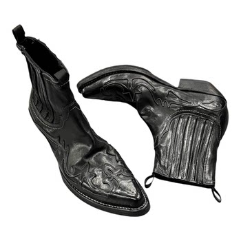 Dark retro western cowboy boots old knight boots