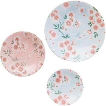 There are imported underglaze colored blue pink cherry blossom plates in ancient kilns