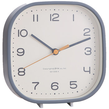 Minimalist small desk clock in the living room that is silent and can be placed or hung