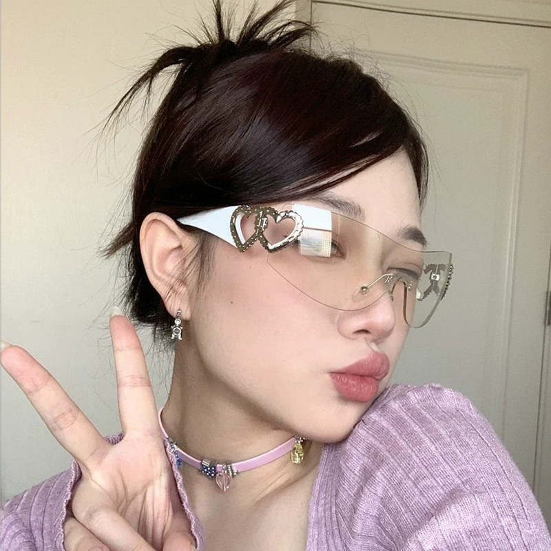 Heart-shaped frameless oval cat-eye sunglasses, trendy European and American hot girls, Y2K street style, internet celebrity sunglasses for posing.