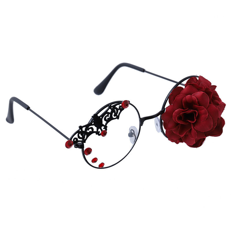 Lolita style with floral glasses, pearl wings, retro punk bat, rose, gothic gear, and a single heart.