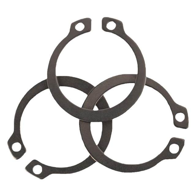 The shaft is delivered to the door with a spring retaining ring
