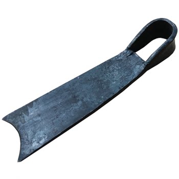 Blacksmith hand hoe agricultural tool loosening soil and plowing the ground
