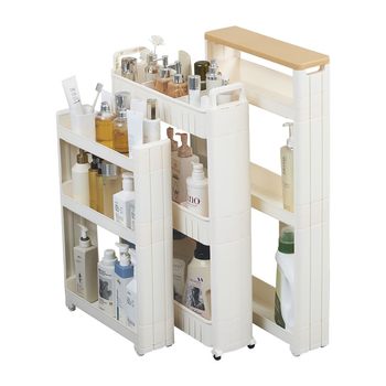 Narrow storage rack gap cabinet behind bathroom door