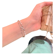 Double-layer bow pearl stacked bracelet light luxury niche exquisite bracelet accessories student high-value gift 2368