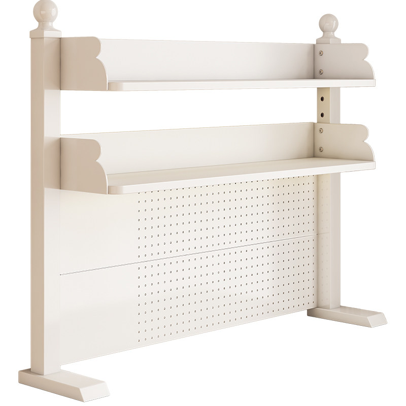 Multi-layer perforated board bookshelf on home computer desk