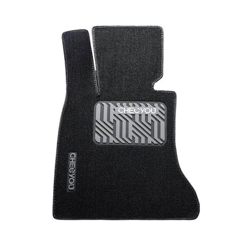 Snowy driver's car floor mats
