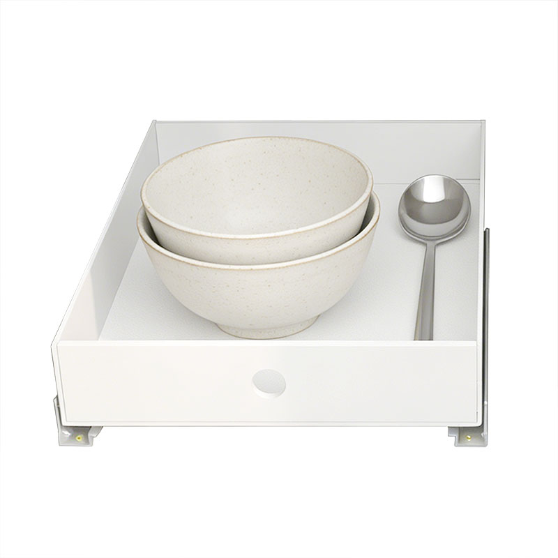All-white kitchen cabinets with deep cabinets remodeled with basket drawers