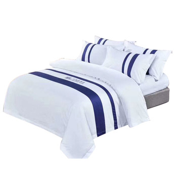 Pure white four-piece hotel bedding set