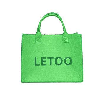 Felt handbag ແມ່ຍິງ 2023 ໃຫມ່ທີ່ມີຄວາມສາມາດສູງ niche tote bag work commuting bag shopping bag