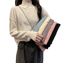 High-collar ear-rimmed knitted bottoming shirt for women in autumn and winter. Loose and versatile short top with design.