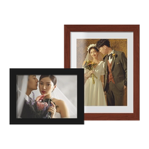 Make a photo album wedding photos hang them on the wall wash the photos and make them into enlarged photo frames family portraits custom-made one-year-old internet celebrity stage production