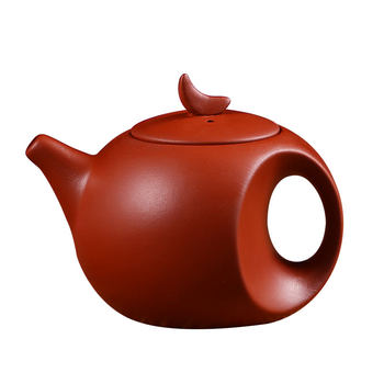 Purely handmade purple clay teapot