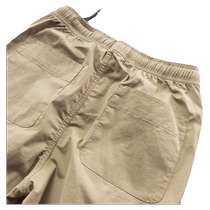 Durable mens sturdy and loose cotton labor insurance pants worn by auto repair workers at construction sites.