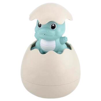 Bathing little duck plays in water and squirts dinosaur eggs