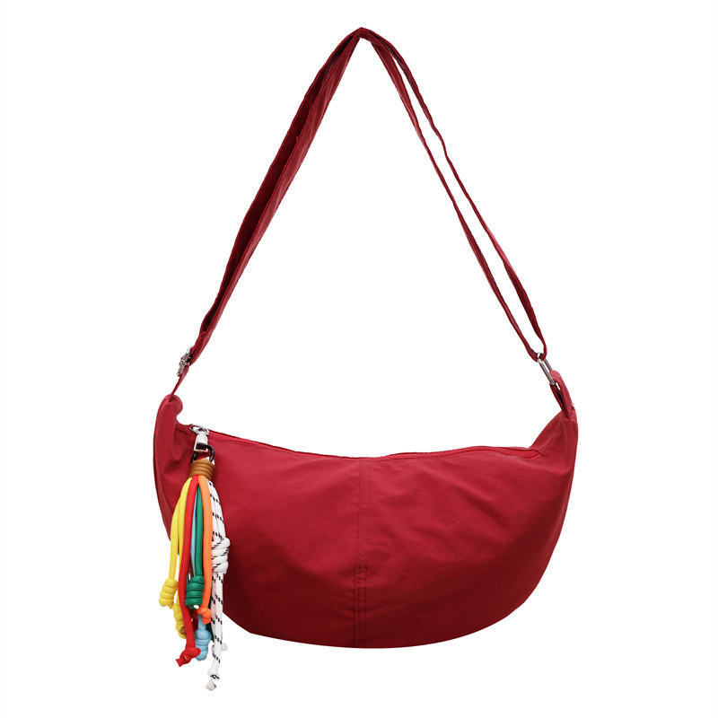 CookieKudos red nylon dumpling bag