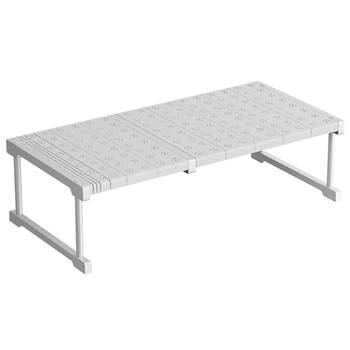 Wardrobe partition layer rack freely superimposed and retractable