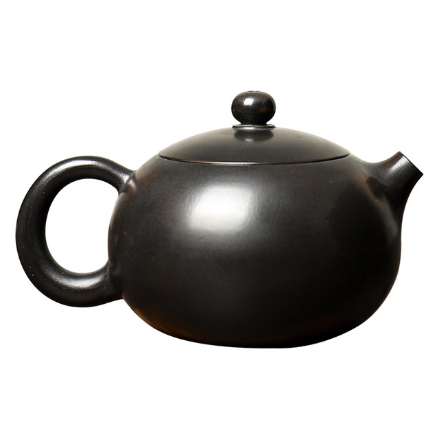 Dian craftsman's unglazed purple pottery is polished and as warm and moist as jade