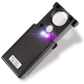 Pull-out magnifying glass with light for identification of jewelry, antiques, coins