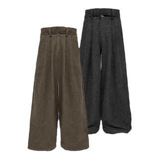 Jcaesar ШЕРСТЯНЫЕ БРЮКИ Брюки-оригами со складками, 85 % овечья шерсть, льняная текстура, двойные складки на талии.