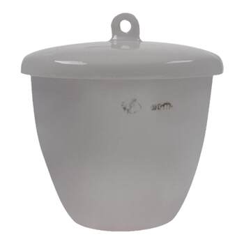 A box of 20 special ceramic crucibles with lids