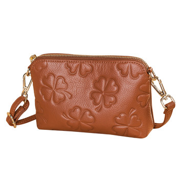 Esunarty embossed leather crossbody bag